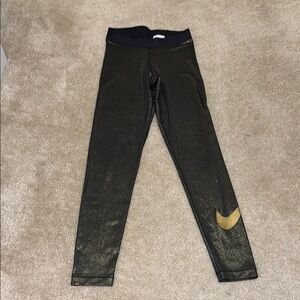Nike Women’s Gold and Black Leggings